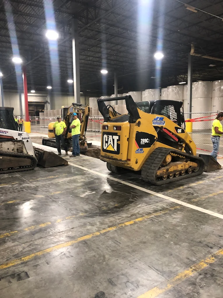 J&H crew on a CAT skid steer job